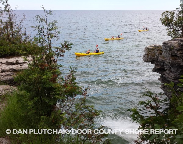 Kayaks at Cave Point County Park. Commercial stock photography by Dan Plutchak/Door County Shore Report.