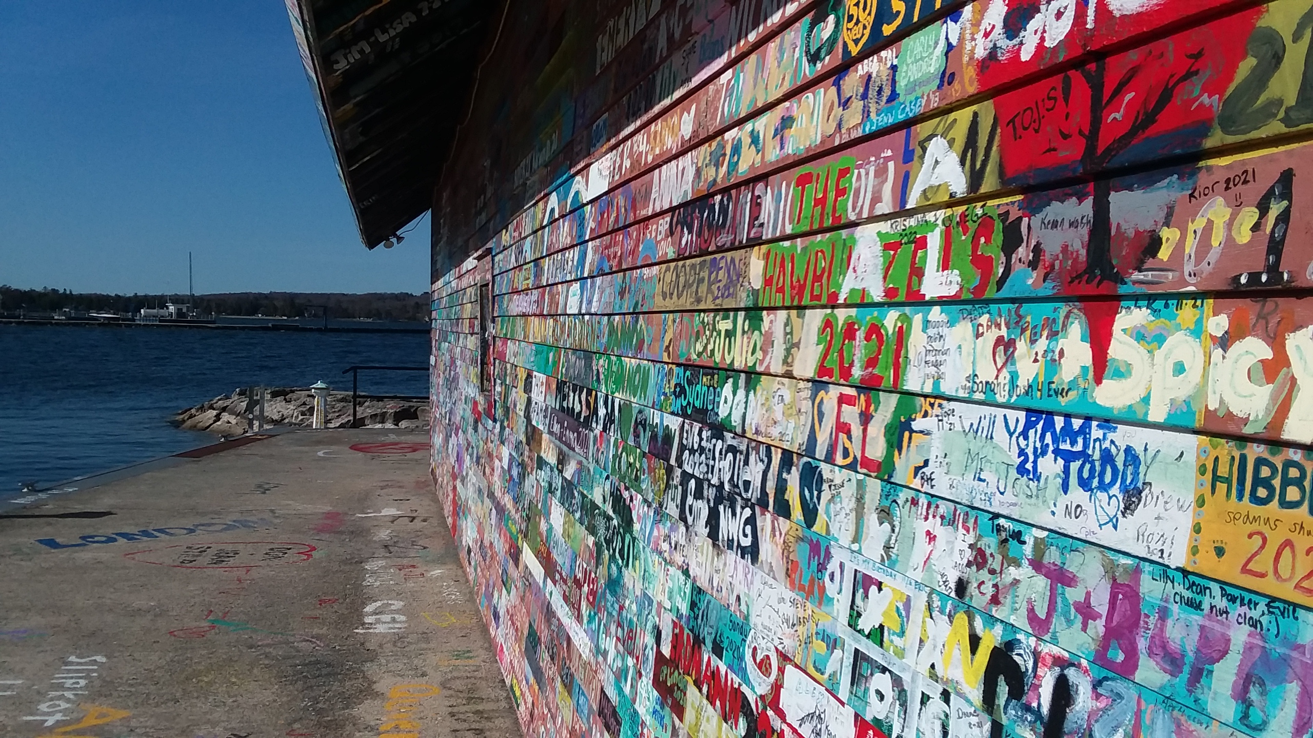 Is it legal to paint your name on the building on Anderson Dock in Ephraim, Door County? The answer is yes, with a few rules.